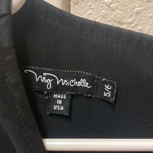 what ; black bathing suit cover up tank dress, it is water proof , 🫧